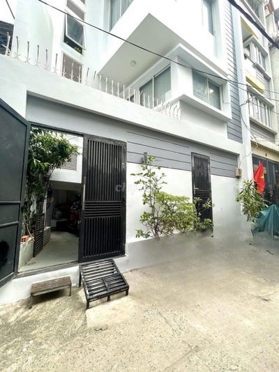 TRẦN QUANG DIỆU-QUẬN 3-GIÁP PHÚ NHUẬN-HẺM XE HƠI-NGANG 7.5M-5 TẦNG ĐẸP
