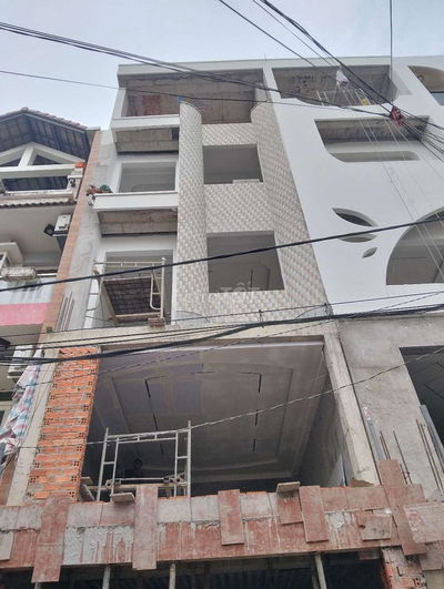 Chính chủ bán nhà hẻm thông xe hơi,có tháng máy, gần ủy ban trường chợ