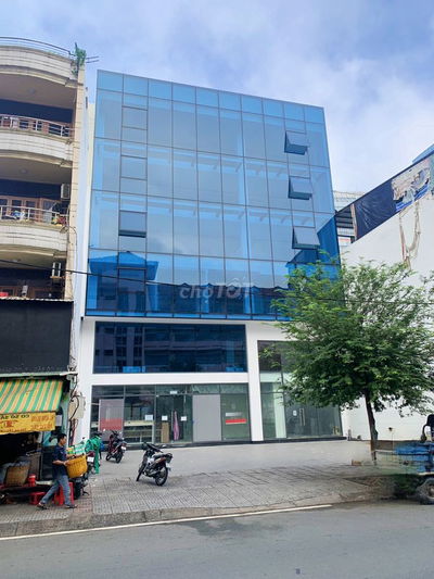 TOÀ NHÀ ĐƯỜNG CAO ĐỨC LÂN 12M X 20M HẦM TRỆT 4LẦU TRỐNG ĐẸP