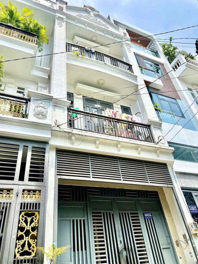 Nhà phố 4 tấm 4Mx14M đang cho thuê 18tr/tháng đường Lê Văn Khương