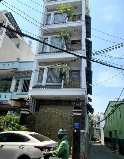Cho thuê nhà HXH góc 2MT 241/2A Nguyễn Thiện Thuật P.1 Q.3