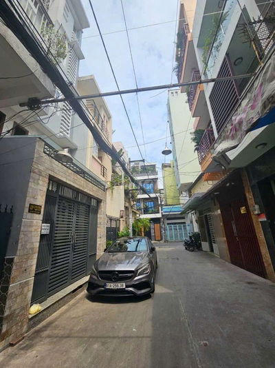 NHÀ BÁN 5 LẦU HXH - ĐANG KINH DOANH CHO THUÊ 400 TRIỆU NĂM