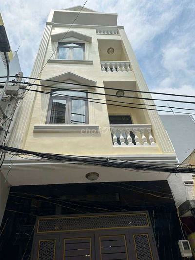 Bán nhà đẹp 5 lầu đường xe hơi 6m Quận 4.