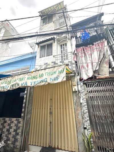 Cần cho thuê nhà hẻm 243 Tôn Đản Quận 4,1 trệt 2 lầu 2 nhà vệ sinh