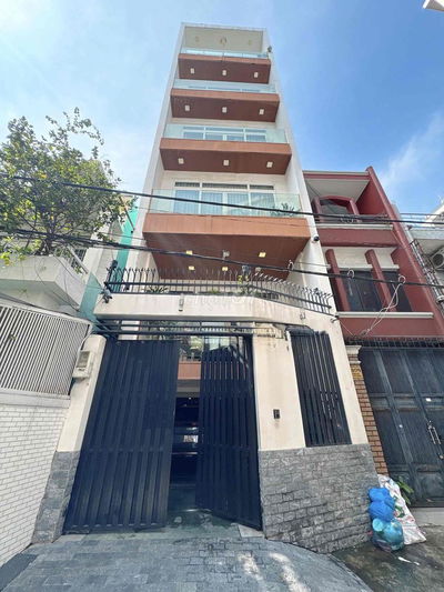 BÁN NHÀ HẺM 120 THÍCH QUẢNG ĐỨC, P4, PHÚ NHUẬN – 6 TẦNG GARA ÔTÔ