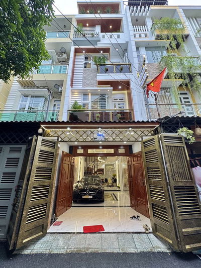 Gần Lottemart Nguyễn Văn Lượng, nhà ĐẸP 4Tầng (4 x 16) OTO VÀO NHÀ