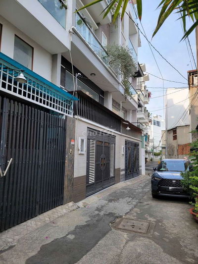 Căn nhà 5 tầng 5..tỷ Hẻm xe hơi đối diện Chợ An Nhơn Full công năng