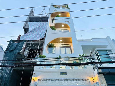 Nhà VIP siêu hiện tại . 1 trệt 4 lầu xe Gara , Thang máy.. 16 tỷ 900