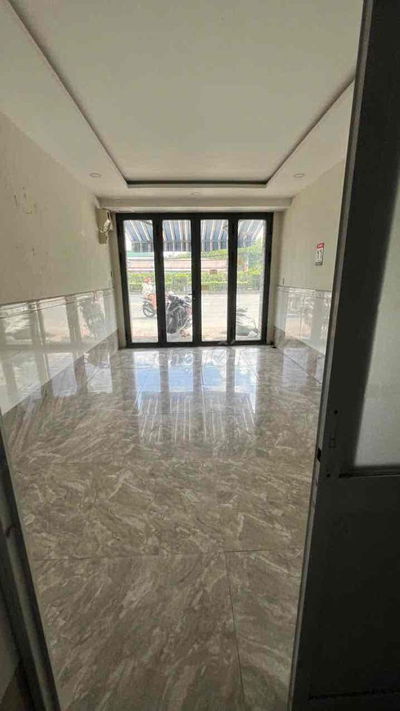 Nhà mặt tiền QL1A gần Nguyễn tất thành