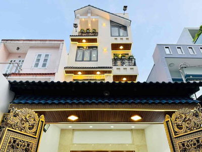 Nhà 1 trệt 4 lầu - Đẹp từng chi tiêt- NT gỗ - Hẻm oto . Giá 13 tỷ 5..