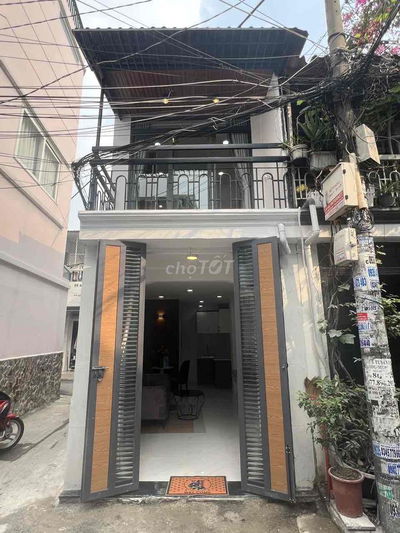 Cho Thuê nhà nguyên căn  Hem 1 trục xe hoi Quang Trung p8 DT 3 x10 trệ