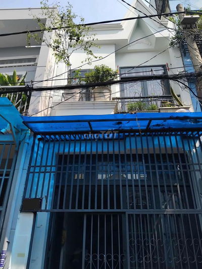 Nhà mới 2 tầng, xe hơi đậu cửa, gần mặt tiền Lê Trọng Tấn.