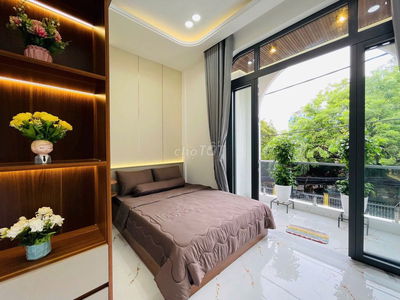 Nhà 2 tầng mặt tiền xe hơi, giao Thống Nhất, Quang Trung