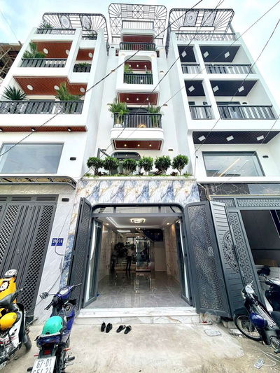 Nhà phố dt 4 x16 xây dựng 5 tầng lầu có thang máy trung tâm q12 hcm