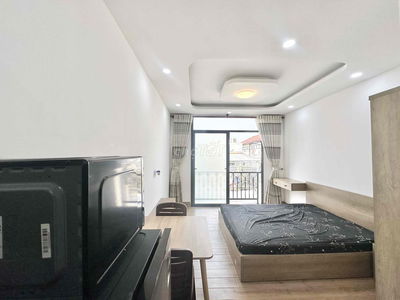 Cho thuê căn hộ mini 35m2 gần chợ Bà Chiểu ban công, máy giặt riêng