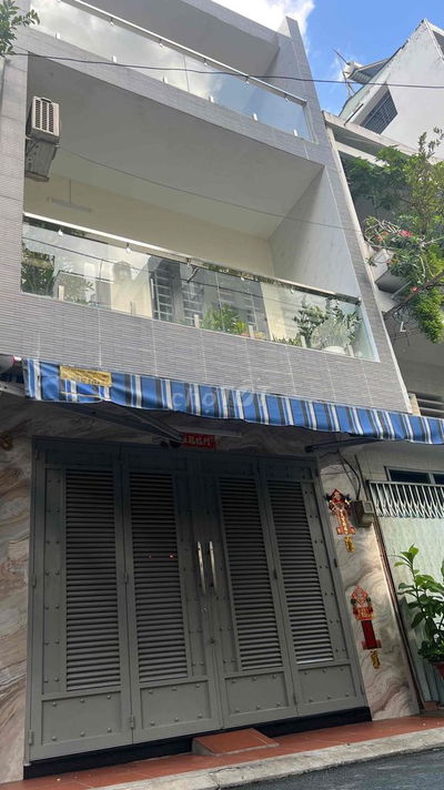 cần bán nhà mặt tiền đường số q.4 gtđđ,