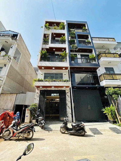 Nhà Mới Sạch Sẻ DT 220m2 1Trệt 1Lửng 3Lầu 5Pn 4Wc Hẻm Xe Tải Ngã Tư Ga