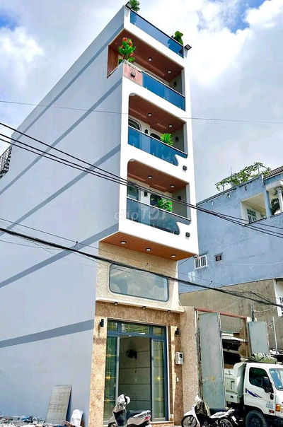 BÁN NHÀ HXH 12M 5 TẦNG AO ĐÔI