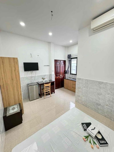 Em cần cho thuê phòng trọ cao cấp mặt tiền quận 3 25m2 full nội thất