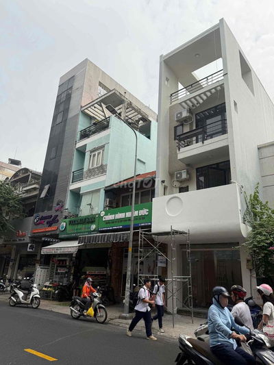 MẶT TIỀN 425 NGUYỄN THÁI BÌNH, P12, Q TÂN BÌNH- 4 TẦNG- HĐT 30TRIỆU/TH