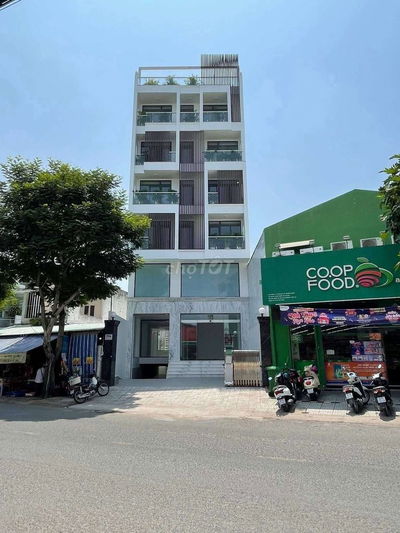 Toà nhà Văn Phòng 1 hầm 7 lầu Thang máy 650kg Mặt tiền Trần Thị Cờ