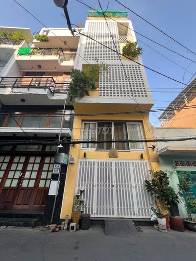 Hẻm xe hơi 5m Trường Sa 6 tầng thông Huỳnh Văn Bánh oto ngủ trong nhà