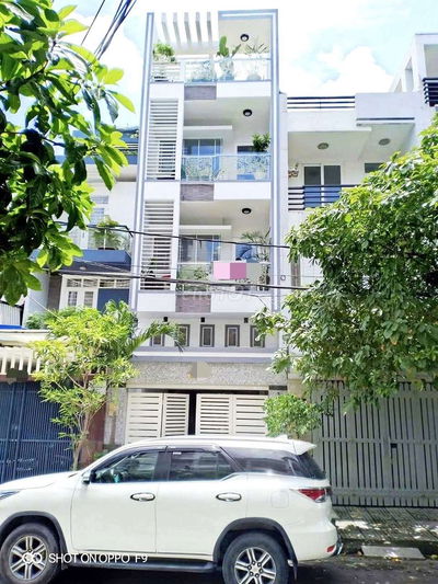 Nhà 4 tầng đường nhựa 12m