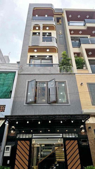 Bán nhà mới có thang máy - 4x16m 1 trệt lửng 3 lầu sân thượng