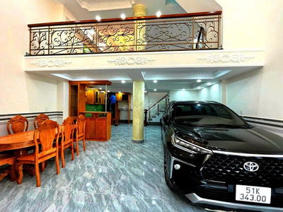 NHÀ GẦN TRƯỜNG TRUNG HỌC 1 TRỆT 1 LỮNG 1 LẦU HẺM XE HƠI.