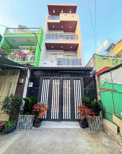 Nhà mới , ngay Cư Xá Phú Lâm A- Hẻm xe hơi