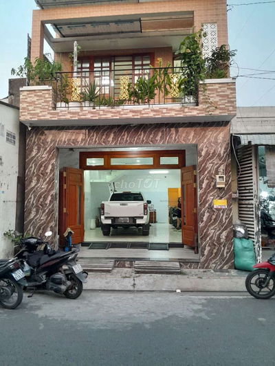 Nhà đẹp 2 tầng Mặt tiền đường nhựa 7m thông,cạnh bên cư xá Bà Điểm