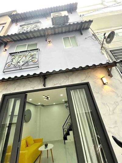 nhà mới 3 tầng dtsd 55m2 1 phòng khách 2 phòng ngủ Tân Quý hơn 2 Ty