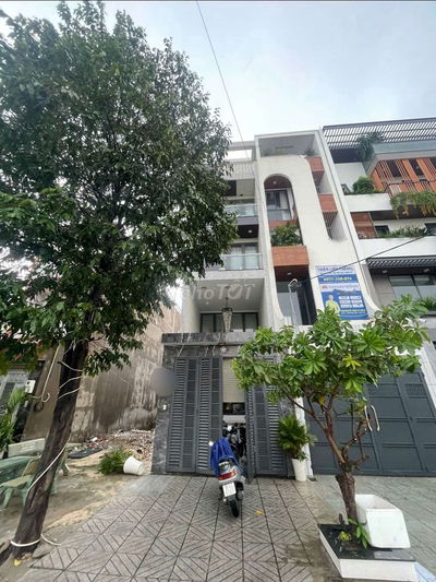 Nhà phố 1 hầm 1 lửng 3 lầu Thang máy MT đường 30m KDC An Sương