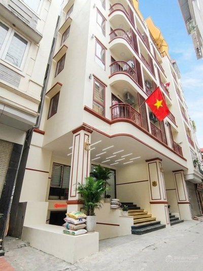 Toà nhà 155m² 8 Tầng MT 6.4m, - 24 Căn hộ cao cấp, 220tr/tháng. Ngõ ô tô tránh, gần ĐSQ Mỹ