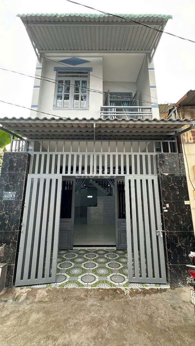 Bán nhà gần chợ bách hóa xanh DT: 4*14m 1 lầu suốt 2pn đường 4m bêtong