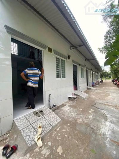 Tôi cần bán dãy trọ gần cầu vượt Củ Chi - 147m2 Ngang 6m có 6 phòng - giá 830 triệu