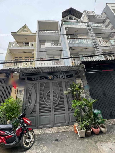 NHÀ 4 LẦU HẺM Ô TÔ KẾ BÊN CÔNG VIÊN LÀNG HOA LÊ VĂN THỌ P11 GV 8TỶ4 TL