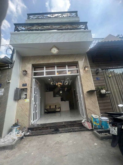 Bán nhà lầu 60m2 hẽm xe hơi xã bình hưng
