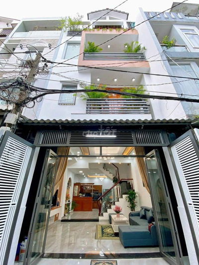 Nhà 4 tầng, hẻm ô tô rộng, gần Vietcombank Gò Dầu.