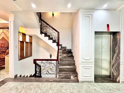 NHÀ THANG MÁY HẦM XE