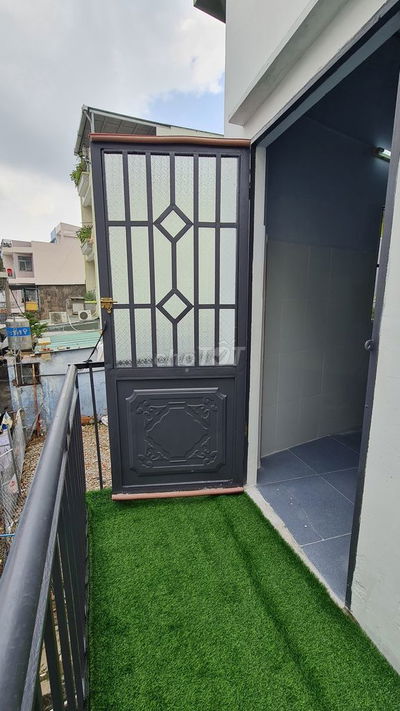 Hẻm 136 Vạn Kiếp, 26m2, có ban công, gác lửng, máy lạnh mới 3.8tr/th
