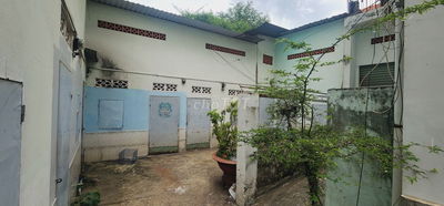 Bán Nhà 2 tầng DT đất 220m2 kèm dãy trọ 7 phòng mặt tiền Nam Cao Q9 cũ