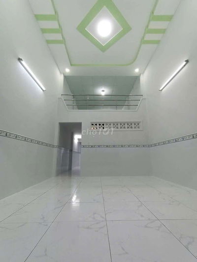 Bán nhà ngay chợ hẻm bêtong 5m thông DT: 4x13m 1T+ lửng 2pn ,2wc