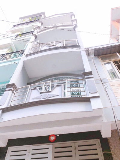 Nhà đường số - 4 tầng - xe hơi đỗ cửa - Vĩnh Hội Quận 4.