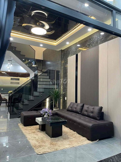 nhà lầu mặt tiềnDX39 gần chợ Phú Mỹ