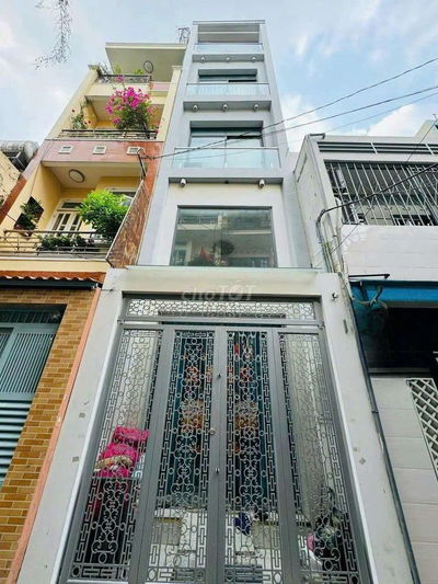 NHÀ 5 TẦNG THANG MÁY HXT CMT8, P.11, Q.3 - DT 33M²