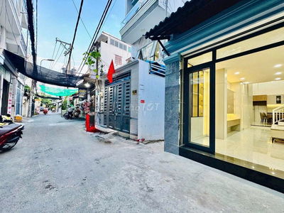 Căn góc HXH Nguyễn Thái Sơn, 4,1 x 13m, 4 tầng, 4pn