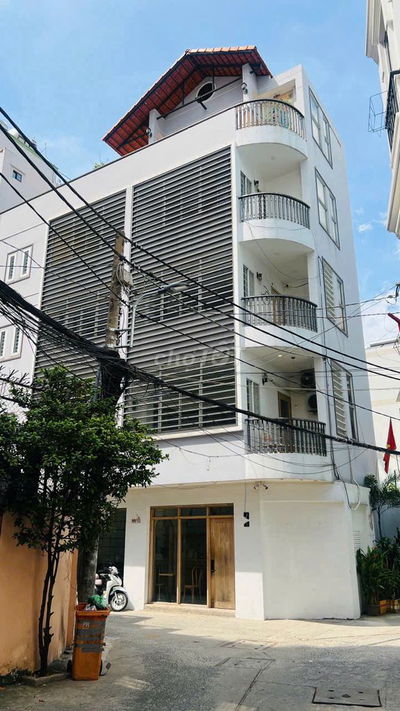 TOÀ NHÀ ỐP KÍNH GÓC 2 MẶT TIỀN NGUYỄN VĂN NGUYỄN, TÂN ĐỊNH, QUẬN 1