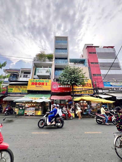 Nhà đẹp 6 tầng có thang máy mặt tiền đường Tân Mỹ Q7 (cạnh PMH)