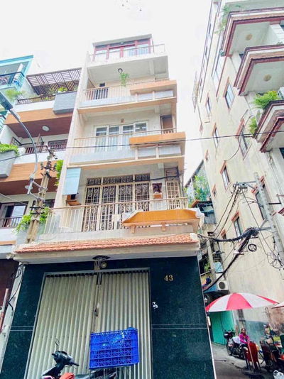 CĂN GÓC 5 TẦNG MẶT TIỀN ĐƯỜNG SỐ 4 CƯ XÁ ĐÔ THÀNH P4.Q3